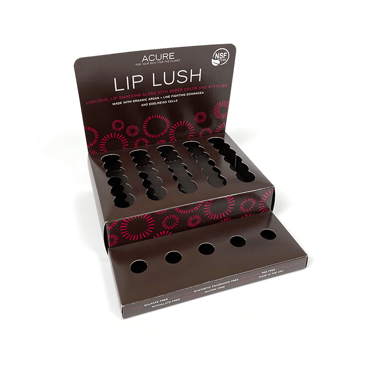 A display box that holds lip product for a skincare brand.