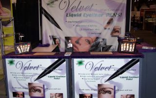 A completed trade show exhibit for a cosmetics company.